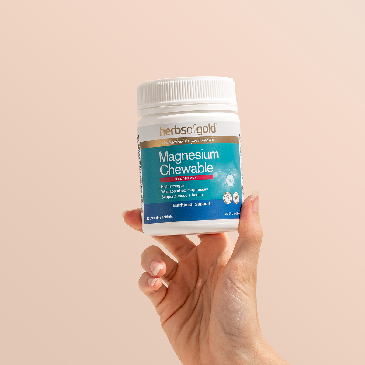 Herbs of Gold Magnesium Chewable tablets in a bottle, dietary supplement with 60 chewable magnesium tablets for daily health support.
