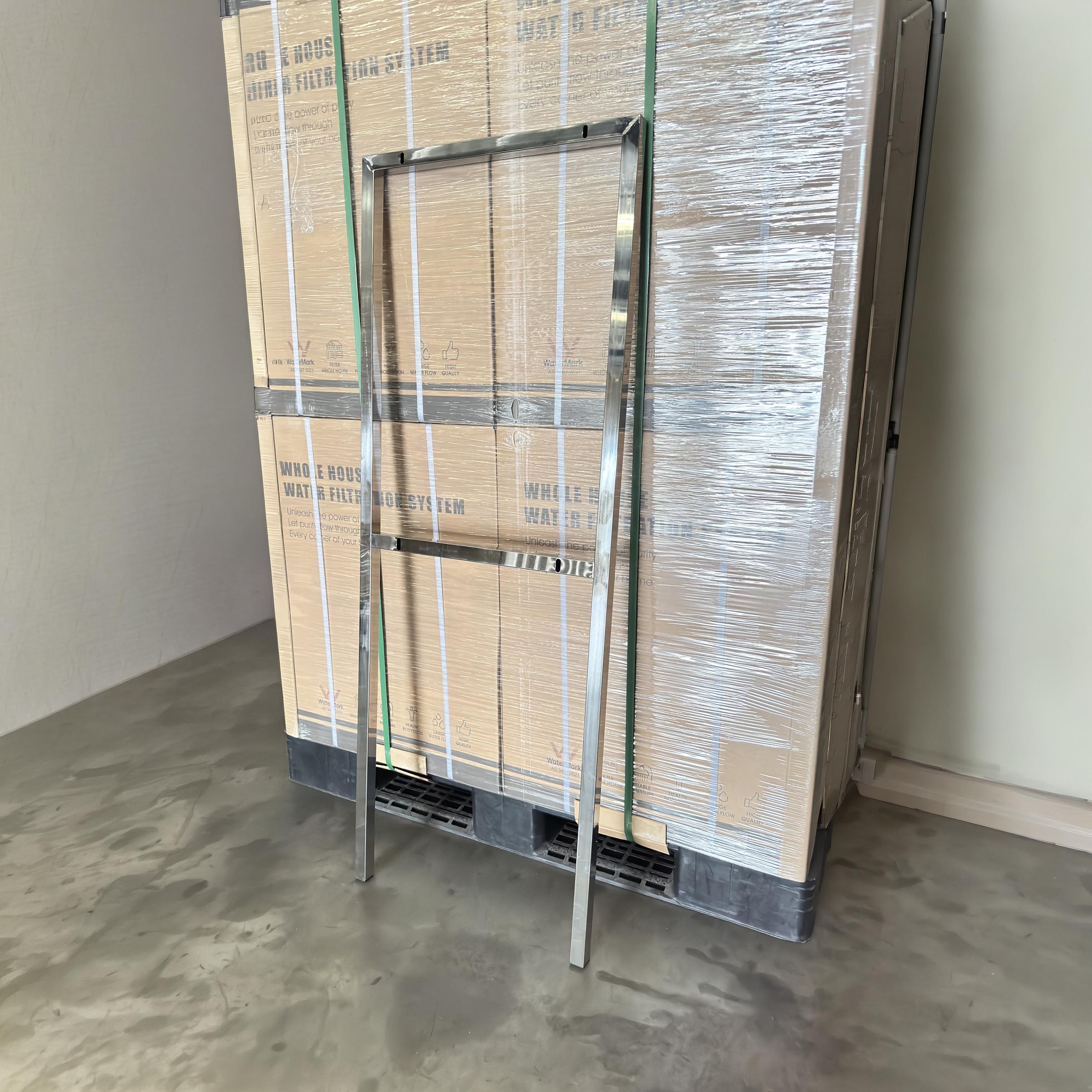 Aquarius Wellness Whole House SS Install Frame showing a sturdy stainless steel frame for whole house filtration system installation.