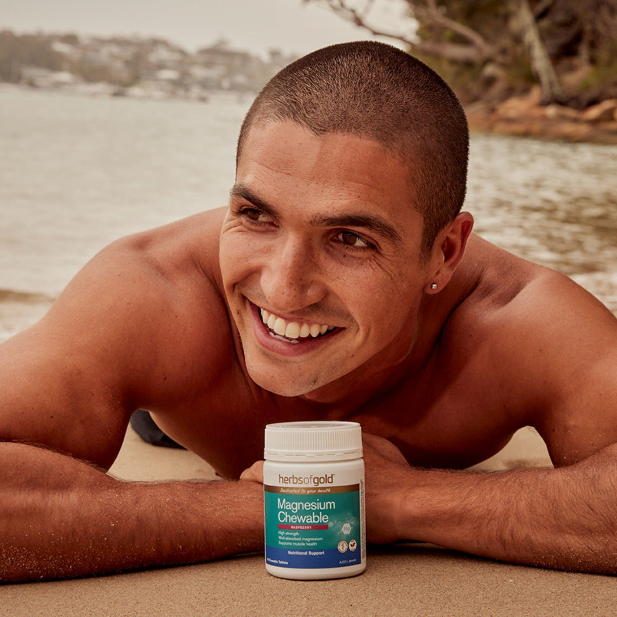 Herbs of Gold Magnesium Chewable tablets, a magnesium supplement with 60 chewable tablets, shown in a clear bottle with tablets inside.