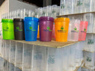 Blue Alkaline World shaker bottle with 400ml capacity, featuring a secure lid and ergonomic design for drinks and protein shakes.
