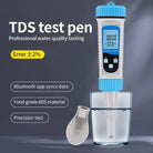 Aquarius Water AW 5 in 1 Water Tester showing digital display, test probes, and buttons for measuring water quality levels.