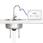 Aquarius Water M25 bench top alkaline ionised structured water filter system showing the compact filter unit on a kitchen counter