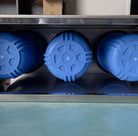 Aquarius Water Whole House Triple System 10x4.5-inch stainless steel cover installed on the filtration system.
