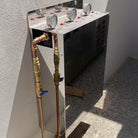 Aquarius Whole House Triple System Stainless Steel Cover 20" x 4.5" installation with gauges and copper connections.