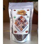 Don Tolman Raspberry Pulse supplement bottle with label featuring raspberries and health benefits.