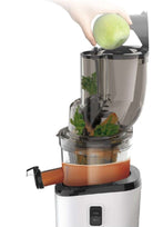 Kuvings REVO830 Cold Press Juicer in matte red, showing the sleek design and juicing chamber of the Kuvings Revo830 juicer.