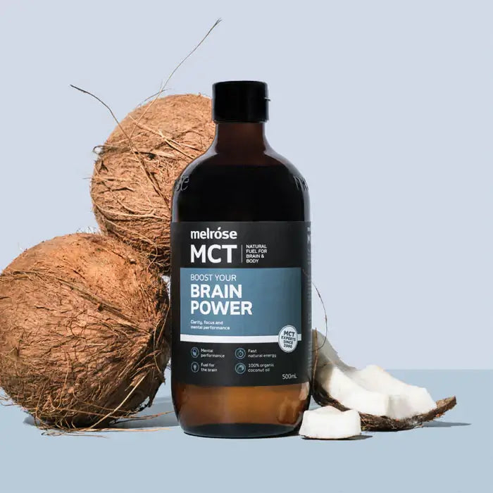Melrose MCT Oil Brain Power 500ml bottle with clear label, featuring a dark glass container and white cap.