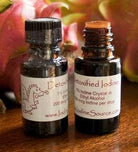 Miracle II Australia Detoxified Iodine 15mL in a small glass bottle, clear liquid with a simple label.