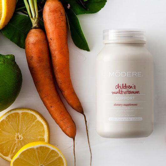 Modere Children's Multivitamin bottle with 120 chewable multivitamin tablets for kids, featuring colorful packaging and child-friendly design.