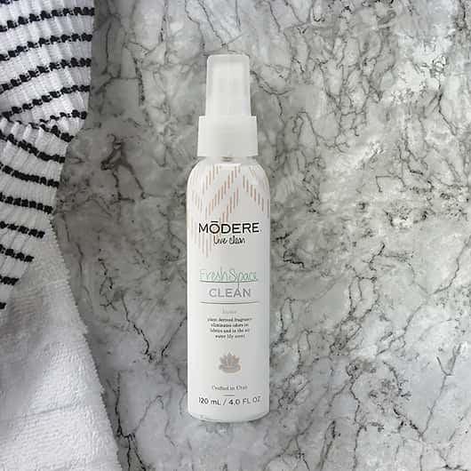 Modere Freshspace 120ml air freshener bottle with a sleek design and label displaying the Modere brand.