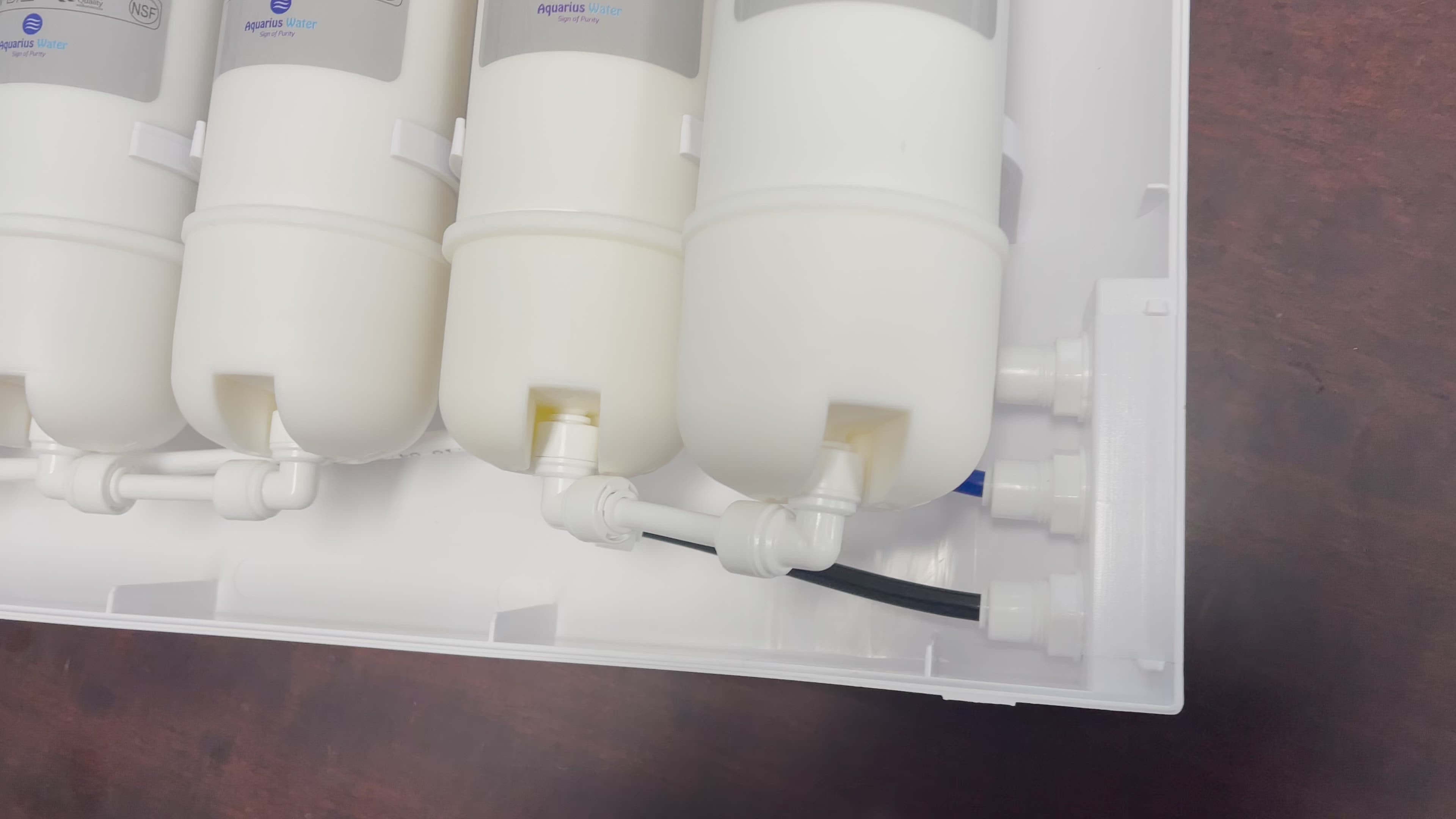 Place a flat screw driver between the filter and the ring and gently push the elbow connector away from the filter. You do not need to apply any force at all.  