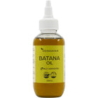 A 100ml bottle of Vrindavan Batana Oil, natural herbal scalp and hair treatment, with the product label visible.