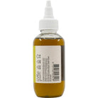 Vrindavan Batana Oil 100ml bottle, natural herbal hair oil with traditional Indian ingredients, in a clear plastic bottle.