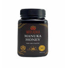 Jar of WARADAA Australian Manuka Honey with 250 MGO, 500g, showcasing the honey's golden texture and label.