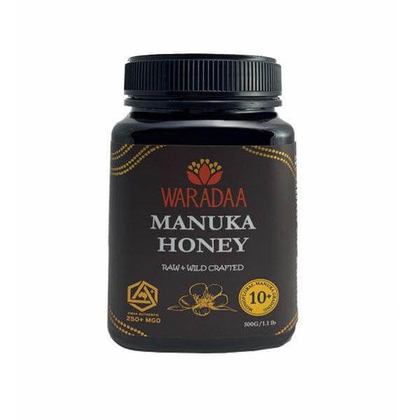 Jar of WARADAA Australian Manuka Honey 250 MGO in a 500g container, showcasing the honey's golden color and smooth texture.