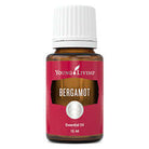 Young Living Bergamot Oil 15ml bottle with a clear label, showcasing the citrus fruit and oil inside.