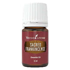 Young Living Sacred Frankincense Essential Oil 5ml bottle with label and dropper cap on a neutral background.